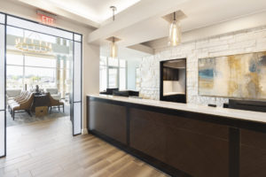 new modern dental office front desk design by Dr. Mark Tholen