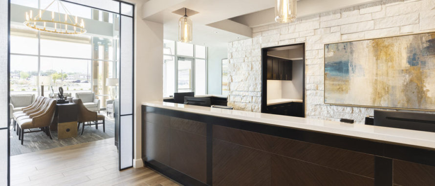 new modern dental office front desk design by Dr. Mark Tholen